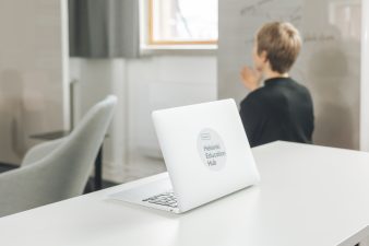 Helsinki Education Hub sticker on a laptop
